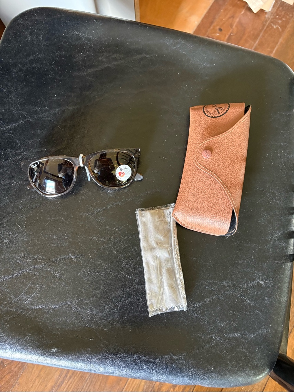 Ray-Ban sunglasses brand new w case and clean cloth.Never out of style! Torti